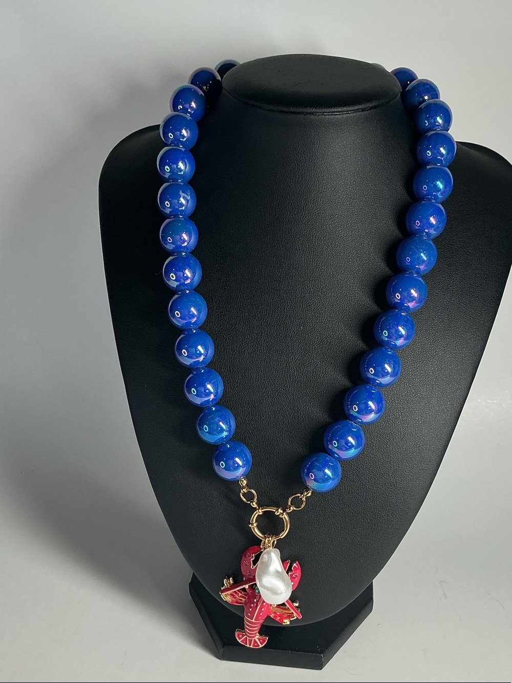 Designer-Style Blue Beaded Necklace with Red Crab Pendant and Pearl Accent